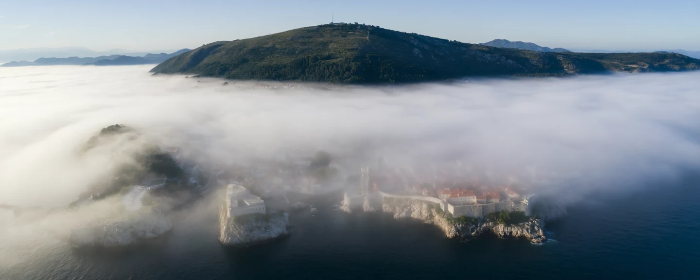 Coastal sea fog at Dubrovnik coastline, generated by our world model