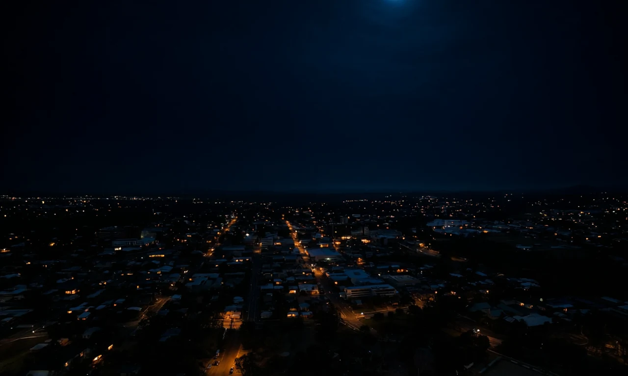 Moonlit city with sparse lighting at Ipswich at sunset, generated by our world model